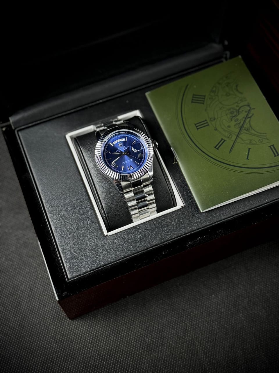 RLX DAY DATE - ROMAN NUMERALS SILVER CASE WITH BLUE DIAL WATCH