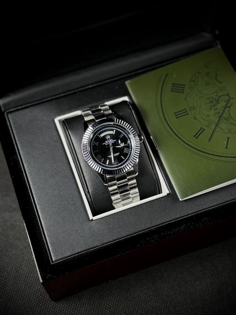 RLX DAY DATE - ROMAN NUMERALS SILVER CASE WITH BLACK DIAL WATCH